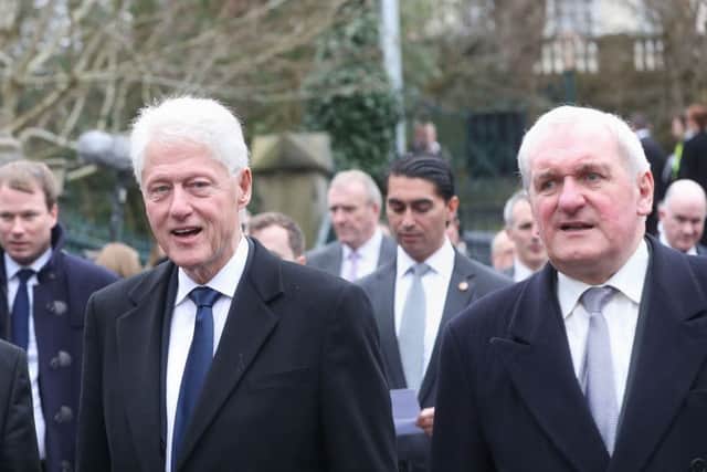 Former US President Bill Clinton (left) and former Taoiseach Bertie Ahern arriving for the funeral of Martin McGuinness, at St Columba's Church Long Tower, in Londonderry. Photo: Niall Carson/PA Wire