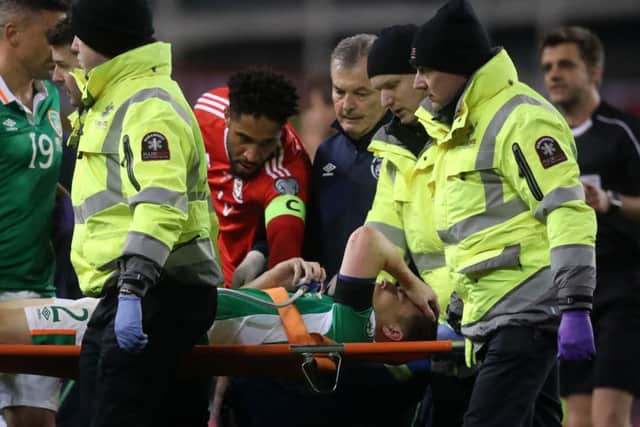 Republic of Ireland's Seamus Coleman is stretcherd off the pitch