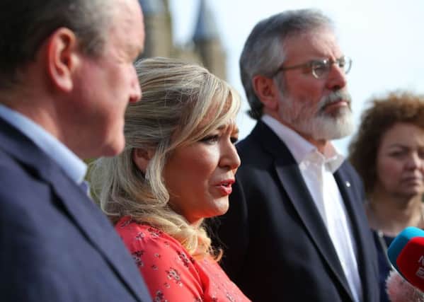 Sinn Fein leaders Gerry Adams and Michelle O'Neill at Stormont Castle after they announced that they will not nominate a speaker or deputy first minister