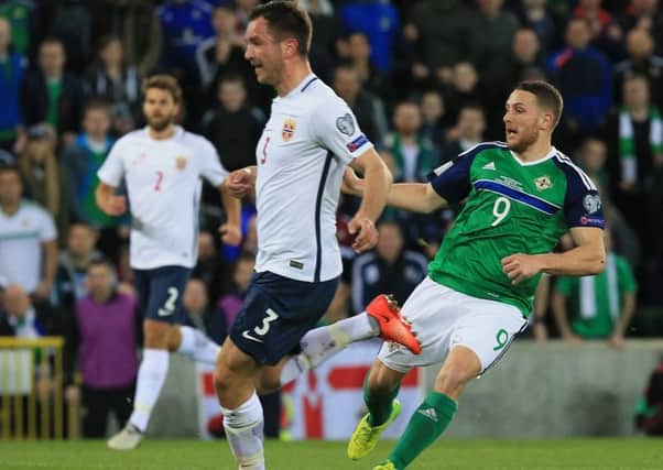 Conor Washington slots home Northern Ireland's second goal against Norway. Pic by Pacemaker.Conor Washington slots home Northern Ireland's second goal against Norway. Pic by Pacemaker.