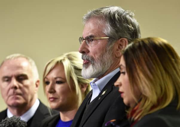 Sinn Fein president Gerry Adams with senior party figures including Michelle ONeill (centre)