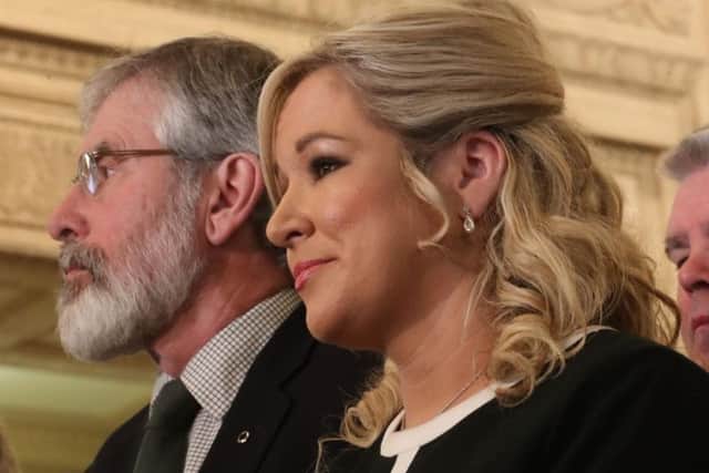 Sinn Fein's Gerry Adams and Michelle O'Neill