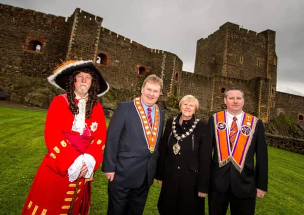 Pictured at the Royal Landing launch event at Carrickfergus Castle are (from left) 'King William',  Deputy Grand Master, Harold Henning; Mid and East Antrim Mayor, Audrey Wales; and Darren McAllister