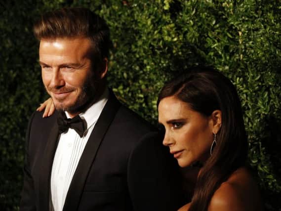 Victoria Beckham pictured with husband, David.