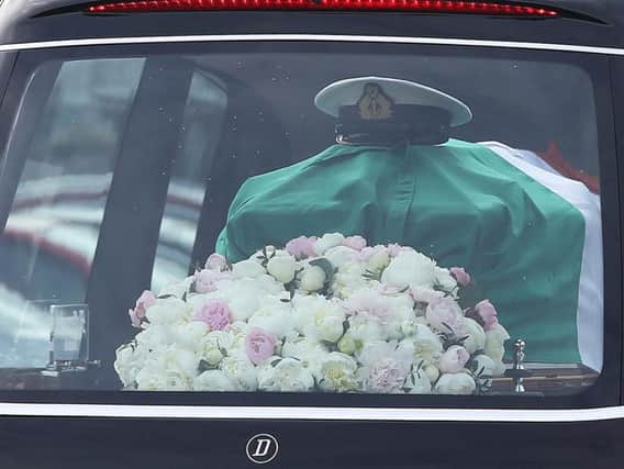 The funeral cortege for Captain Mark Duffy leaves St Oliver Plunkett Church in Blackrock, after he died when the Irish Coast Guard helicopter he was in crashed off the coast of Co May