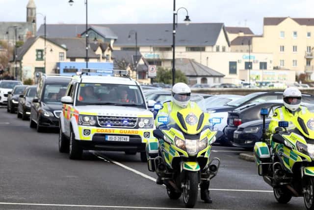 The funeral cortege for Captain Mark Duffy leaves St Oliver Plunkett Church in Blackrock, after he died when the Irish Coast Guard helicopter he was in crashed off the coast of Co Mayo.