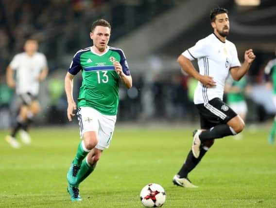 Corry Evans in action for Northern Ireland against Germany