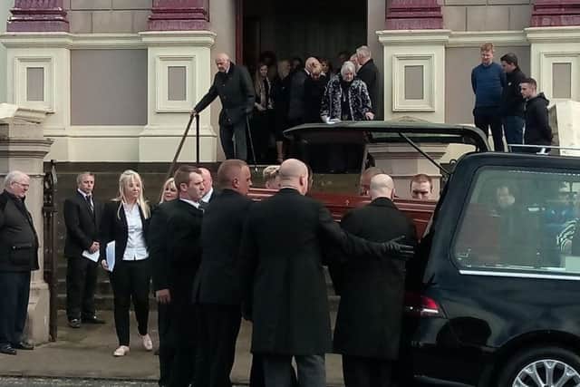 Jack Glenn's relatives emerge following his funeral at Ebrington PResbyterian Church on Saturday afternoon.