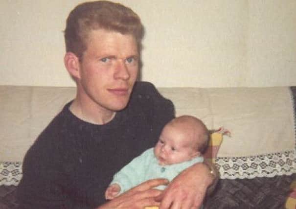 Debbie Carson as a baby in the arms of her father Herbie Kernaghan, who was murdered on October 15,1979