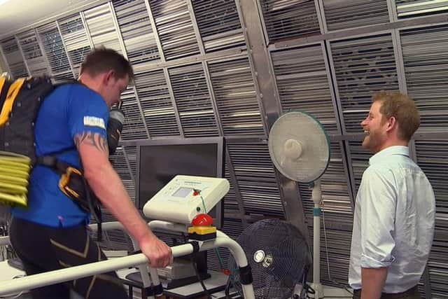 Prince Harry has surprised a former soldier who lost both his legs in a bomb blast in Afghanistan by paying him a visit as he trains for a gruelling endurance race across the Sahara desert.
