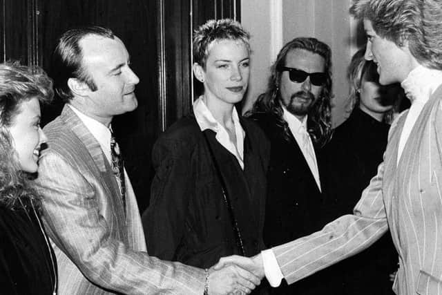 File photo dated 31/03/88 of the Princess of Wales meeting Kylie Minogue, Phil Collins and Eurythmics singers Annie Lennox and Dave Stewart at a charity luncheon at the Cafe Royal in aid of the 'Help a London Child' appeal.