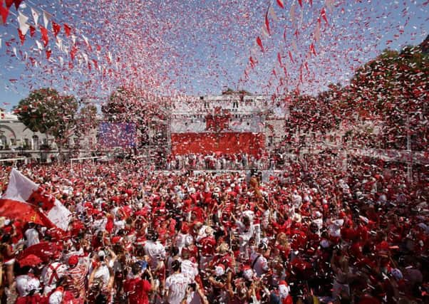 People in Casemates Square, Gibraltar, celebrate National Day in 2015 following a speech by Chief Minister Fabian Picardo. Photo: Yui Mok/PA Wire