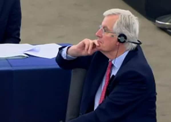 Mr Barnier after being prompted to listen