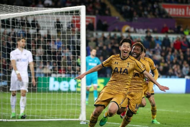 Tottenham Hotspur's Son Heung-Min celebrates scoring his side's second goal of the game during the Premier League against Swansea