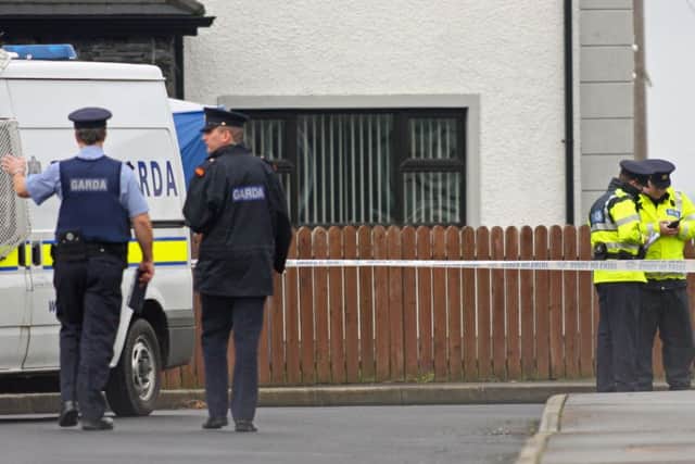 Gardai officers pictured at the scene of the fatal shooting of Andrew Allen at Links View Park.