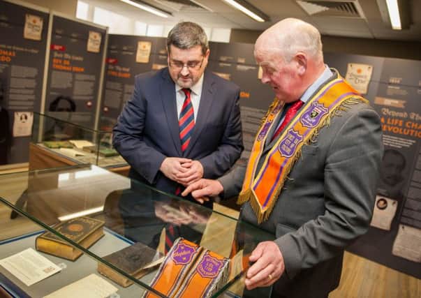 Dr Jonathan Mattison (left), museum curator with Edward Stevenson, Grand Master of Grand Orange Lodge of Ireland, at the opening of the exhibition