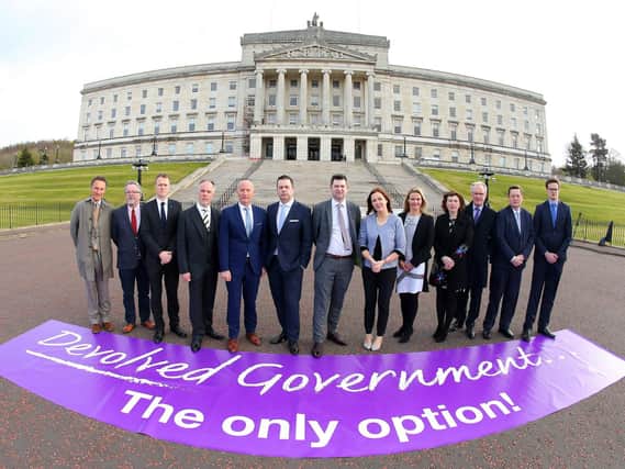 Handout photo dated 11/04/17 issued by Press Eye of a group of business and civic society leaders at Stormont demanding a restoration of devolution
