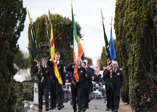 Easter Rising commemorations,such as this Sinn Fein event at Glasnevin Cemetery, Dublin,were held around Ireland. Photo: Brian Lawless/PA Wire
