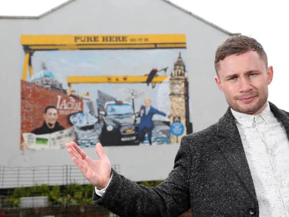 Pictured at Harps Pure Here mural launch in Hill Street is local boxing legend, Carl Frampton who has teamed up with Harp lager and artist Dean Kane from Visual Waste to unveil an iconic new piece of street art in Belfasts Cathedral Quarter, celebrating the people, sights and humour unique to the city.