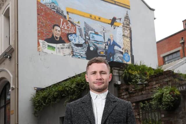 Pictured at Harps Pure Here mural launch in Hill Street is local boxing legend, Carl Frampton