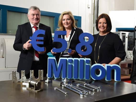 Undated handout photo issued by the Special EU Programmes Body of (left to right) Director and Chief Executive of South West College Malachy McAleer, CEO of the Special EU Programmes Body (SEUPB) Gina McIntyre, and Jill Cush Head of Innovation and Business Development for South West College, as they announce funding worth 5.8 million euro (4.9 million) for a cross-border EU-funded project will generate almost 60 years of renewable energy research.