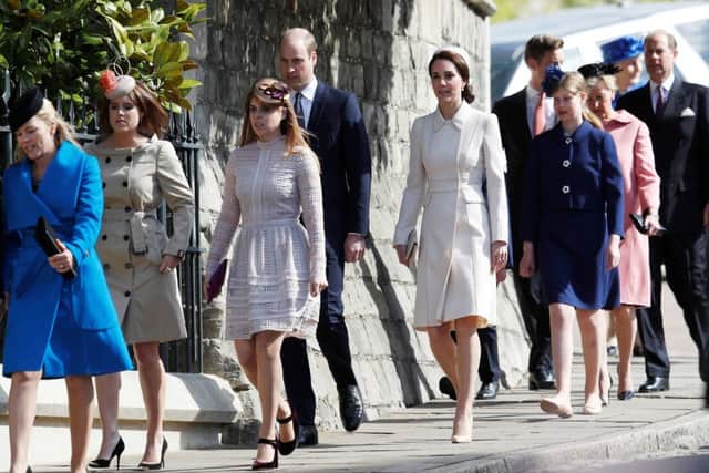 The Duke and Duchess of Cambridge (centre) and Princesses Eugenie (second left) and Beatrice (third left) along with other members of the Royal family, arrive for the Easter Sunday service at St. George's Chapel at Windsor Castle in Berkshire. Photo: Peter Nicholls/PA Wire