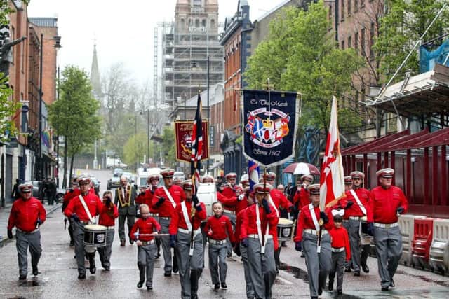 A feeder parade passes St Patricks Catholic Church in Donegall Street, Belfast