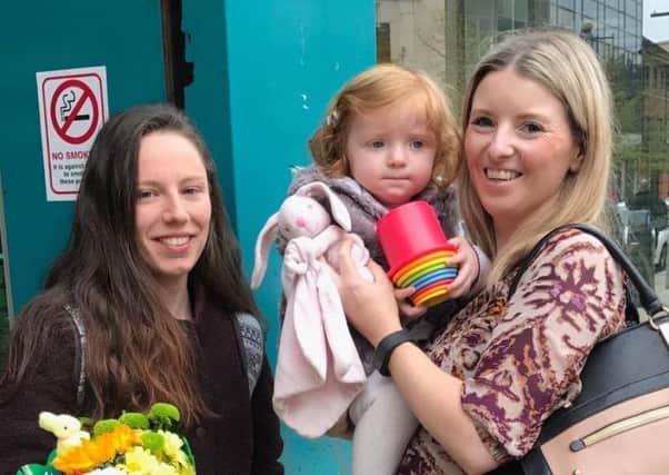 Little two year-old Aoife is reunited with her favourite toy, 'Bunny'. Included is mum Jaclyn (right) and Karen Conlon who found the toy.