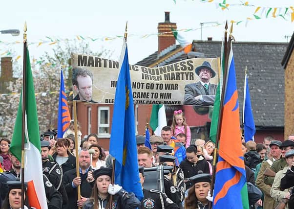 The banner was carried in an Easter Tuesday parade in the Ardoyne area of north Belfast