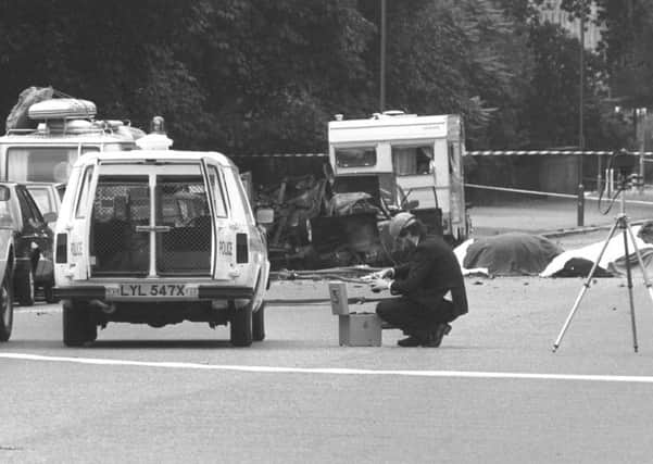 A police photographer at the scene of the Hyde Park bombing in 1982