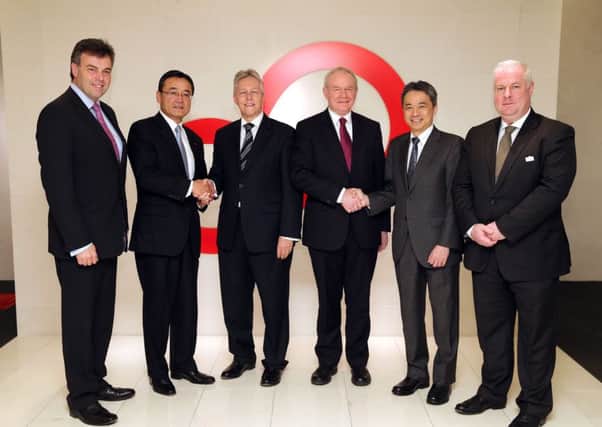 First Minister Peter Robinson and deputy First Minister Martin McGuinness met with President Masami Yamamoto of Fujitsu Limited during their visit to Japan in December 2013, where they thanked Fujitsu for its long standing commitment to Northern Ireland and discussed further investment.  
Pictured left to right are: Alastair Hamilton from Invest NI,  President Masami Yamamoto of Fujitsu Limited, First Minister Peter Robinson, deputy First Minister Martin McGuinness, Fujitsu Corporate Vice President Akihisa Kamata, and Greg McDaid, Director for Northern Ireland at Fujitsu UK & Ireland.

Picture by Kelvin Boyes / Press Eye.