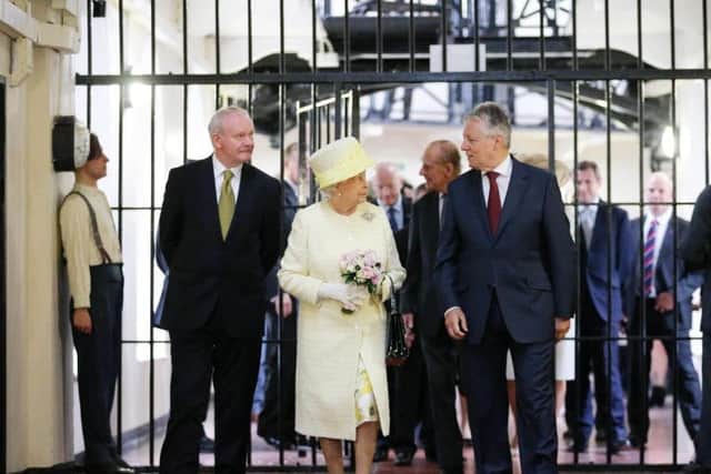 Peter Robinson and Martin McGuinness with Her Majesty The Queen and His Royal Highness The Duke of Edinburgh during their visit to Crumlin Road Gaol, Belfast.