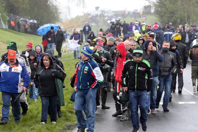 Fans make their way home after the Tandragee 100 was called off on Saturday.