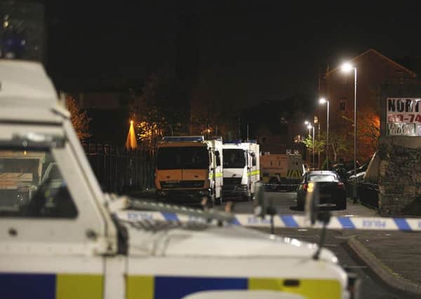 A view of the area where dissident republicans left a bomb which was discovered in an alleyway beside Holy Cross Boys' Primary School in Ardoyne, north Belfast