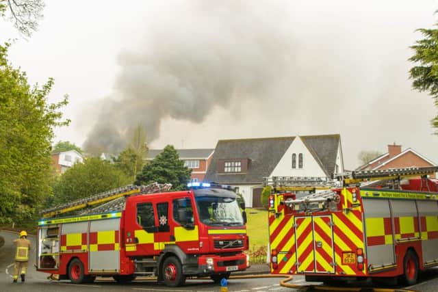 Firefighters from Lisburn and Belfast were called to the blaze at Derryvolgie House on Saturday evening. Pic by Jim Shields