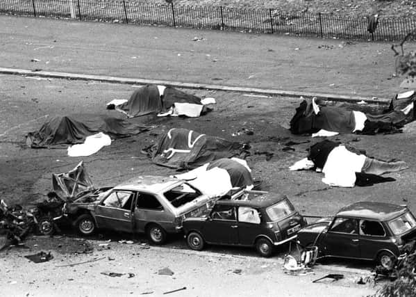 Dead horses and wrecked cars after the Hyde Park bomb in 1982