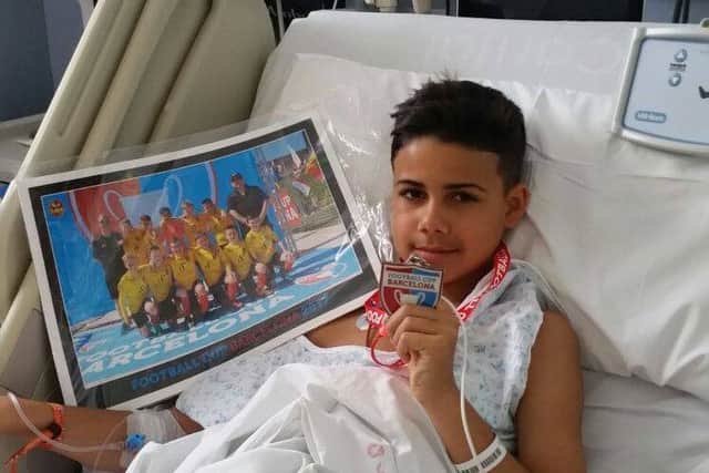 Shea Murphy who is in hospital in Spain after being seriously injured during a football tournament