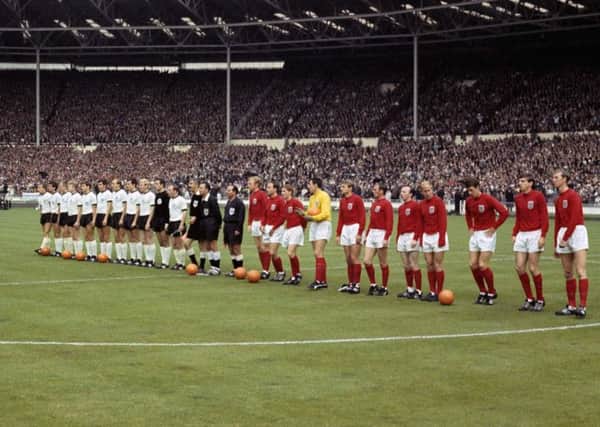The England and West Germany football teams lining up before the 1966 World Cup final.  Picture PA.
