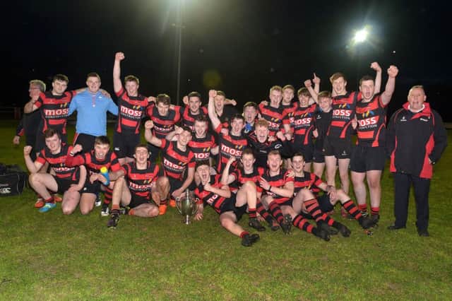 Armagh  celebrate with the Nutty Krust Under 18 trophy after winning the floodlit Tournament. at Chambers Park. (Photo by TONY HENDRON.)