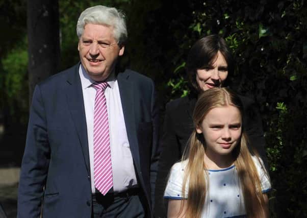 Alasdair McDonnell and his wife Olivia Nugent with daughter Aileen, pictured in summer 2015