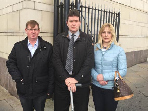 Victims campaigner Willie Frazer (left) with Colin Worton, whose brother Kenneth was murdered during the 1976 Kingsmill massacre, and Barbara Worton outside Laganside Court in Belfast, following a preliminary hearing