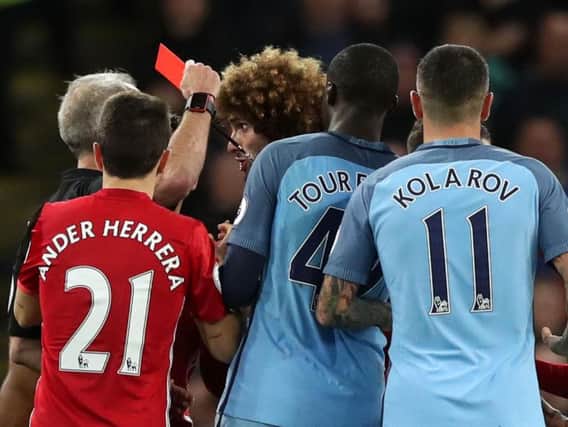 Manchester United's Marouane Fellaini was sent off in the derby