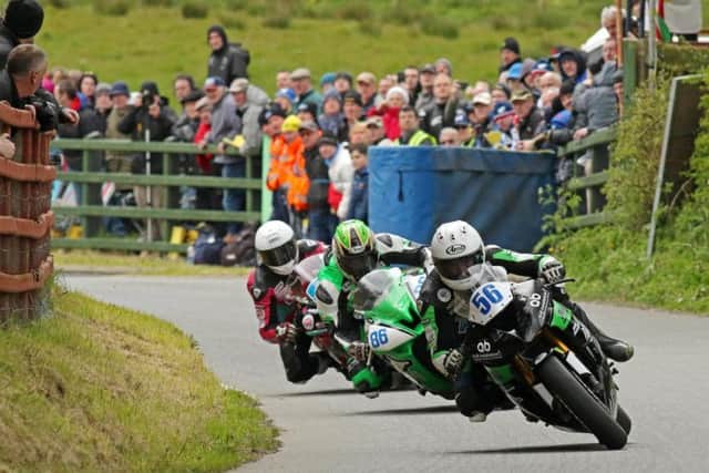 Supersport race winner Adam McLean leads Derek McGee and James Cowton at the Cookstown 100.