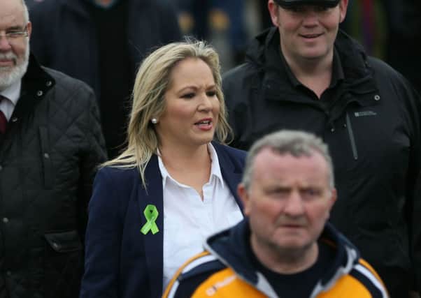 Michelle O'Neill takes part in a march to Cappagh, Co Tyrone, commemorating the 30th anniversary of the shooting dead of eight IRA members at Loughgall