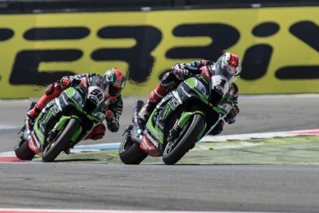 Jonathan Rea leads his Kawasaki team-mate Tom Sykes in race two at Assen.