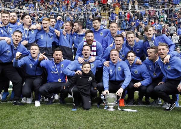 Linfield players celebrate winning the Gibson Cup. 
Photo: Aidan O'Reilly/Pacemaker Press