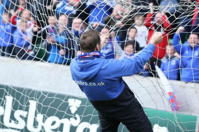Linfield goalkeeper Roy Carroll celebrates with the Linfield supporters at Windsor Park. 
Picture by Brian Little/PressEye