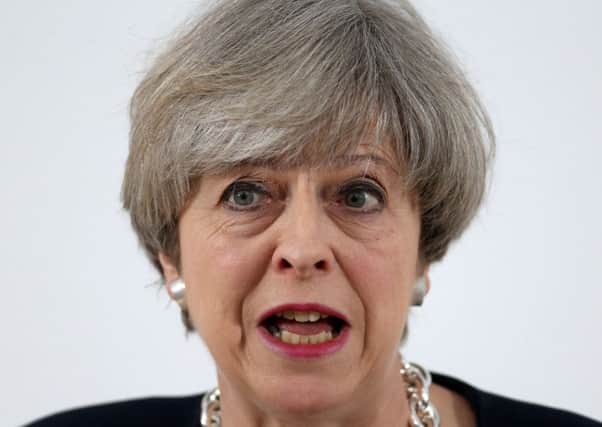 If still prime minister after the election Theresa May faces a recommendation to quickly resolve compensation for victims of Gaddafi-IRA terrorism