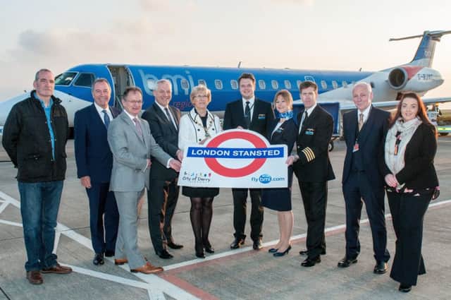 Pictured before the inaugural flight are Roy Devine, airport chairman, Graeme Ross, BMI, John Kelpie, council CEO, Mayor Hilary McClintock, Mitch Phillips, senior first officer, Vicky Gotts, cabin crew, Bill Gill, captain, Tom Wilson, bmi and Charlene Shongo marketing and communications manager CODA