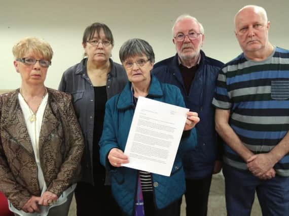 (left to right) Priscilla Clarke, Pat Irvine, Margaret McCready, Tommy McCready and Sam Irvine, at Solicitor Kevin Winters offices in Belfast, they all lost relatives in the in the McGurk's bar bombing in 1971 and have called for a fresh inquest into their deaths.